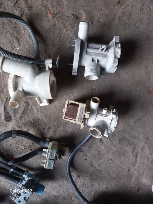 Улитка сливного насоса стиральных машин разные