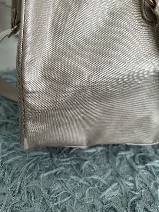 Geanta de voiaj sau sala Michael Kors.