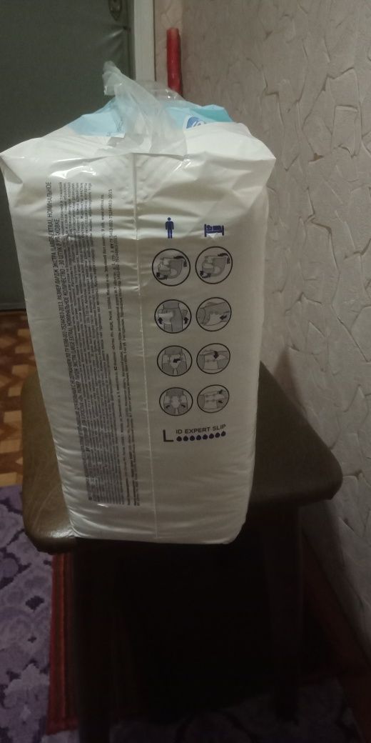 Подгузники  новые