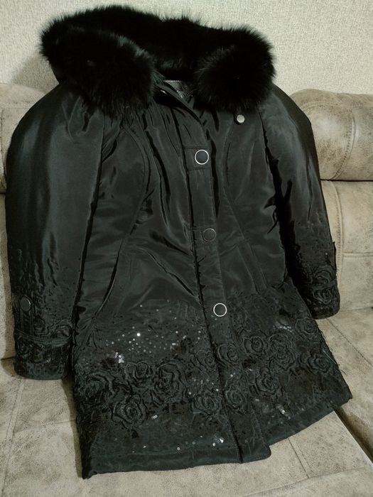 Продам женский пуховик