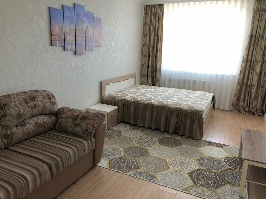 По часам квартира на Сауран 10б