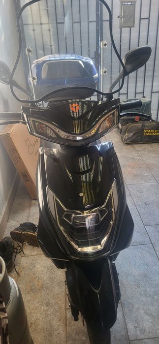 Scuter electrica aproape nou