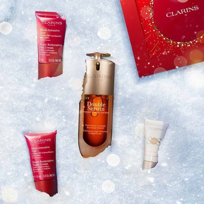 Подаръчен комплект двоен серум Clarins, възстановяващ крем и SOS крем