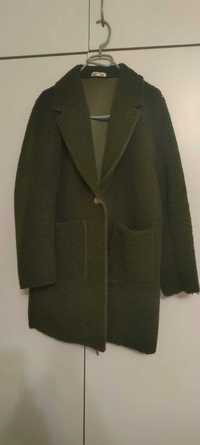 палто произведено в Италия