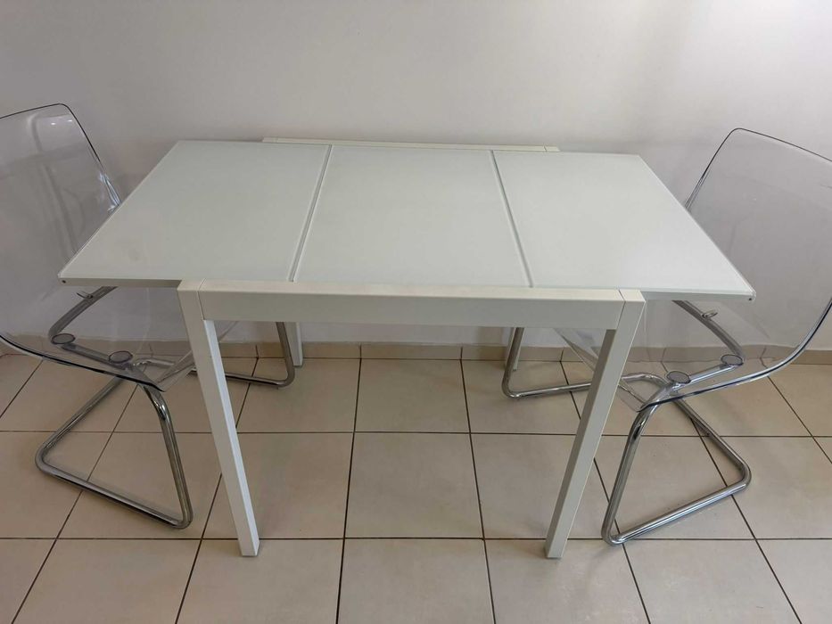 Masă sticlă extensibilă Glivarp Ikea + 2 scaune Tobias trnsp/cromat