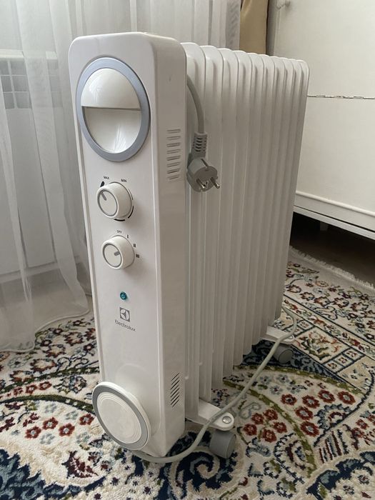 Масляный обогреватель