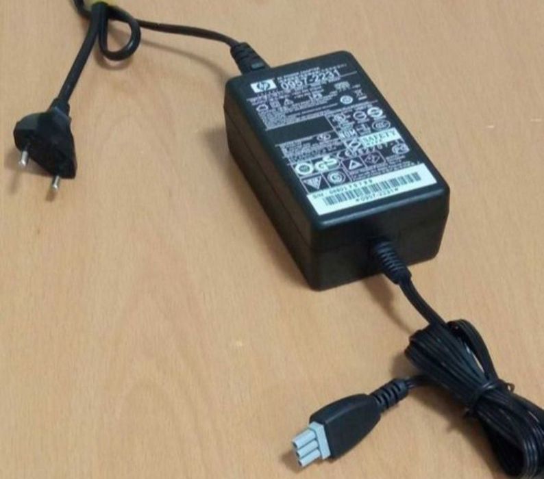 Alimentator HP pentru Imprimanta .Are 2 Tensiuni iesire 32V 375mA