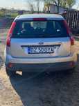 De vânzare ford fiesta în două uși ,cu motor 1.3 benzină