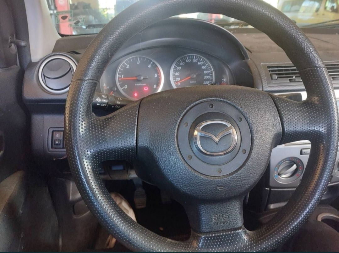 Mazda 2 на части