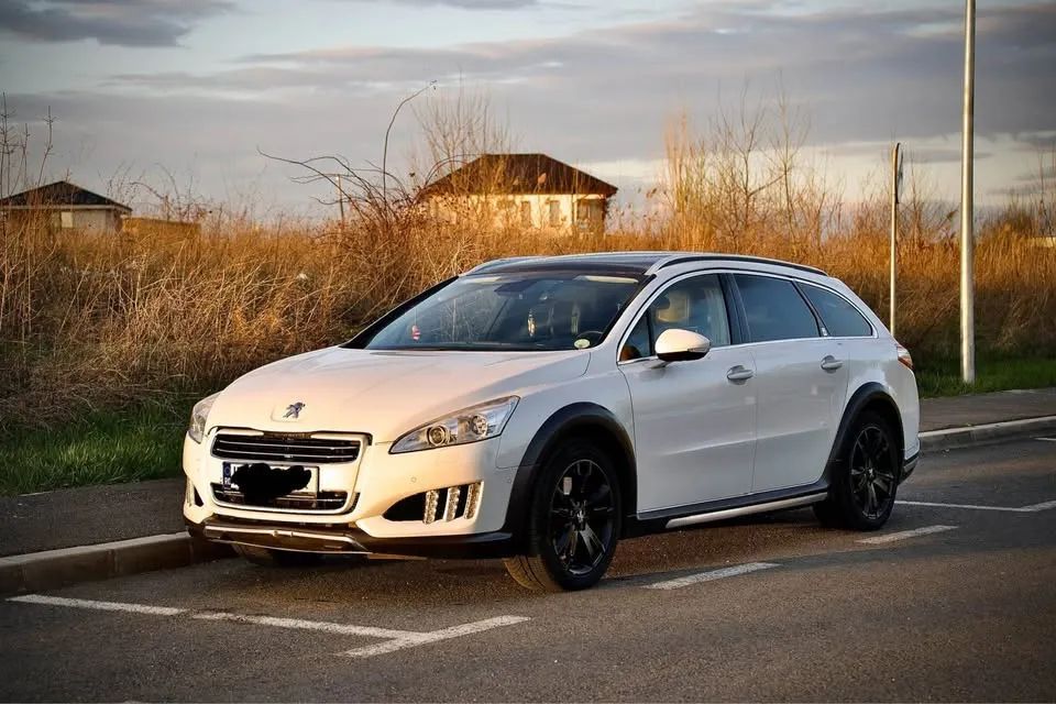 Peugeot 508 Peugeot 508 RXH 2.0 Hybrid4 • 2012 • Automată • 4x4 • Panoramic • Full