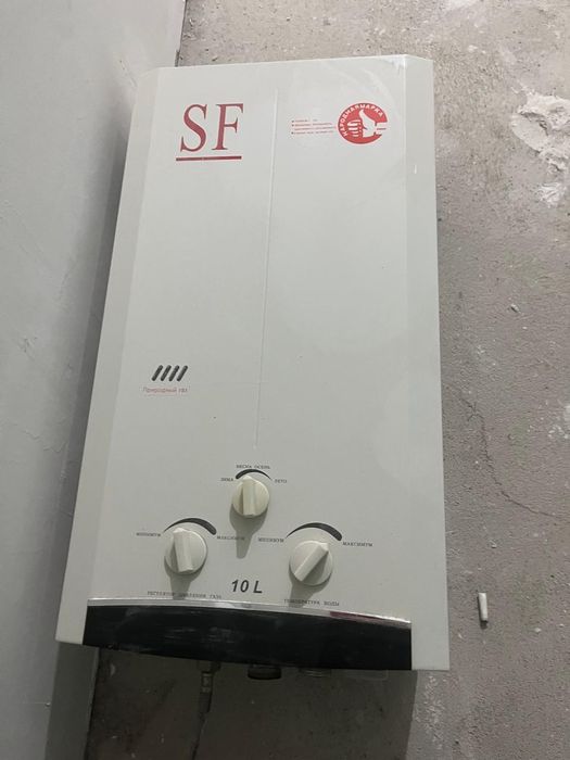 Газовая колонка в рабочем состояние