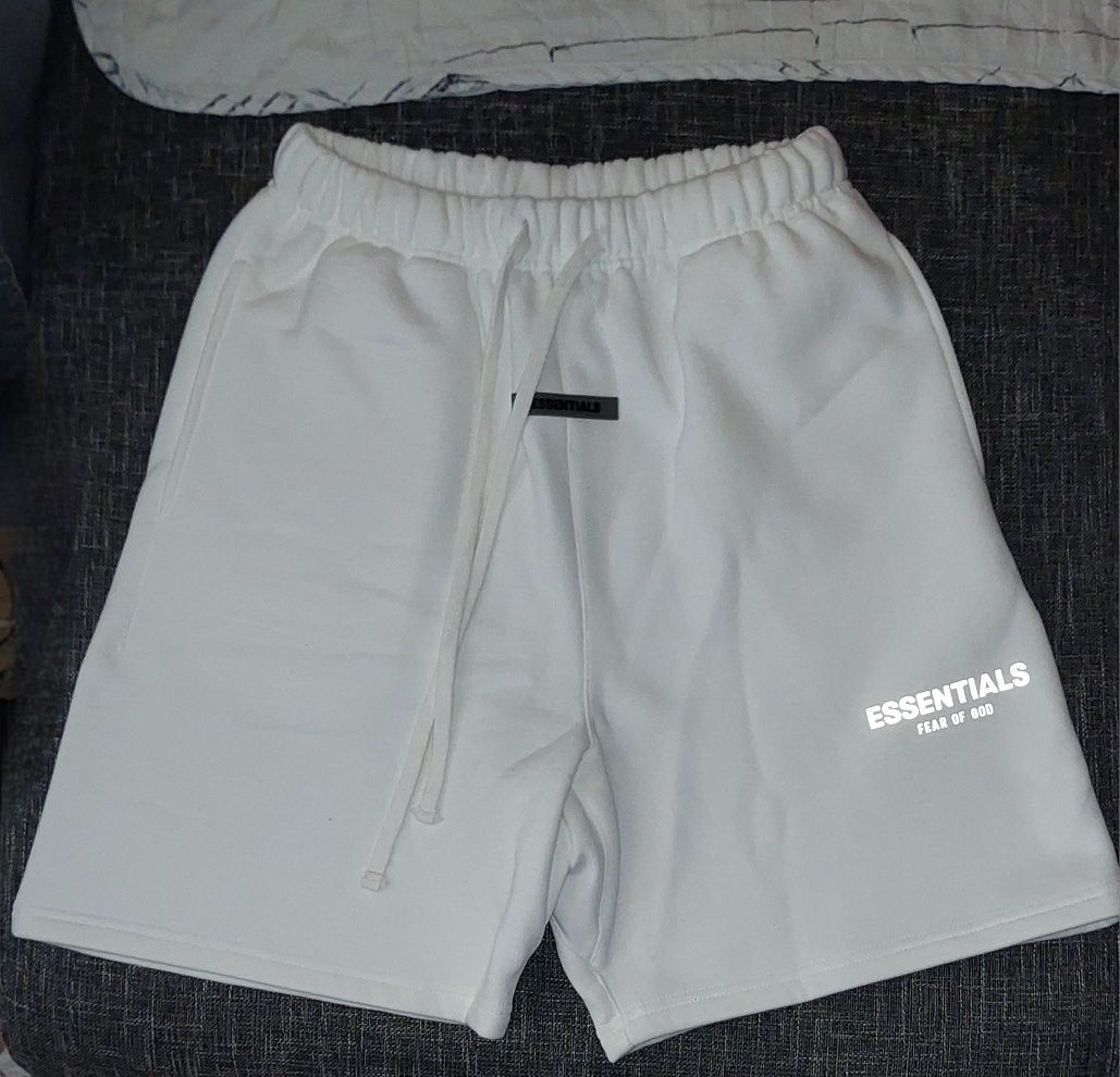 Fear of God Essentials white shorts