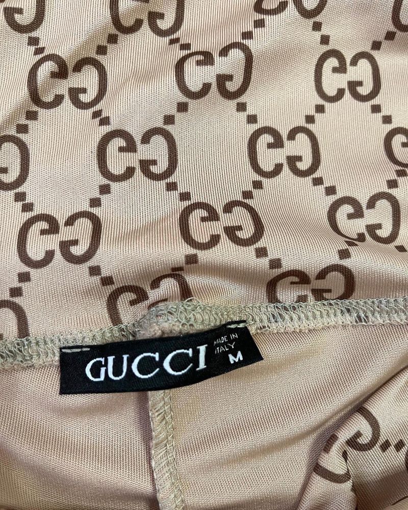 Colanti Gucci si Dior