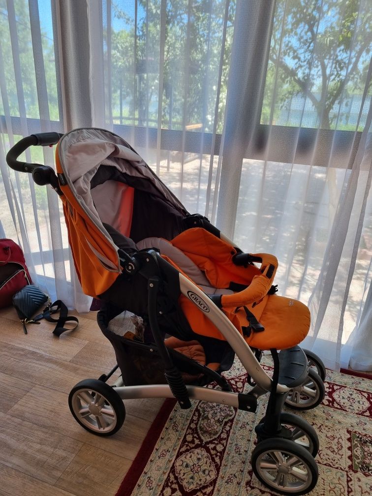 Продам коляску Graco Quattro toursport