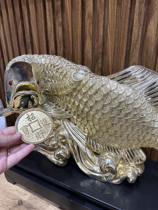 Золотая рыбка с монеткой