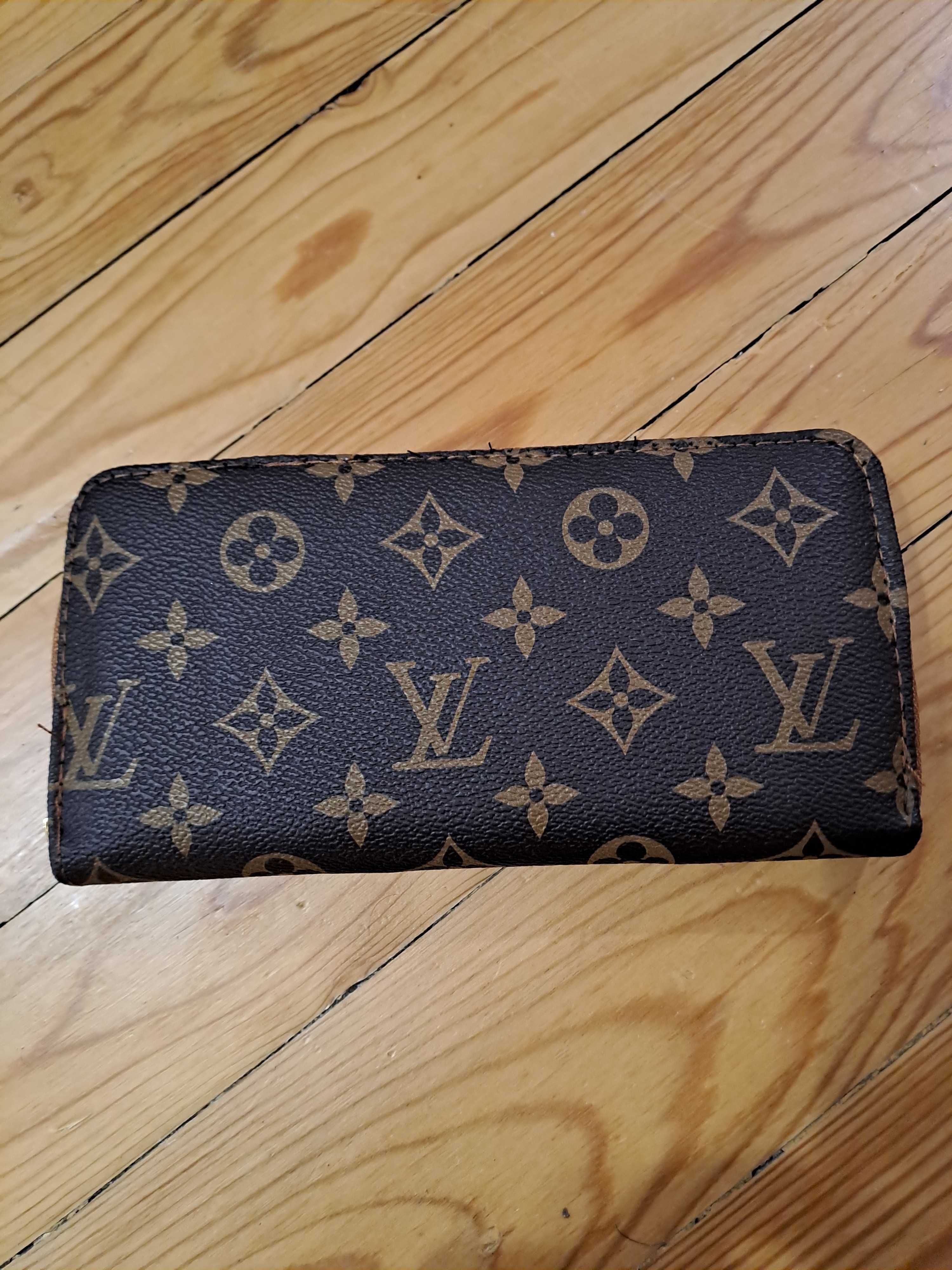 Портмонета на ''Louis Vuitton''