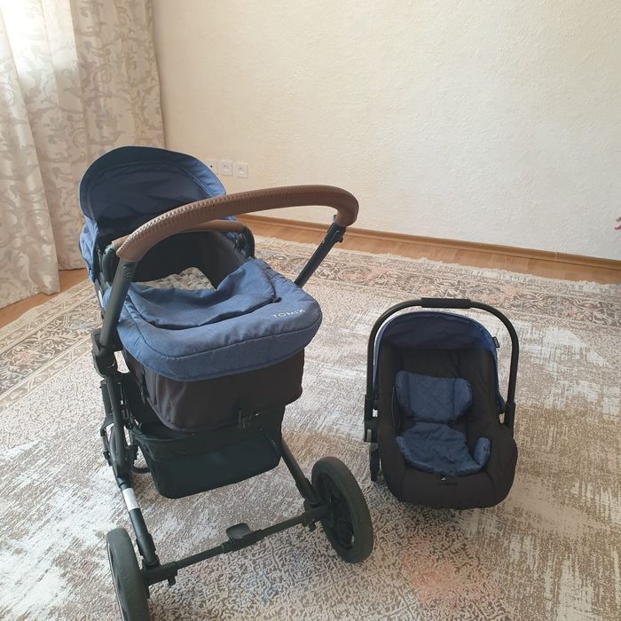 Продаётся коляска фирма Tomix в комплекте автолюлька