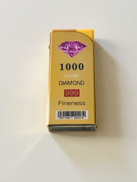 Златиста запалка  против вятър