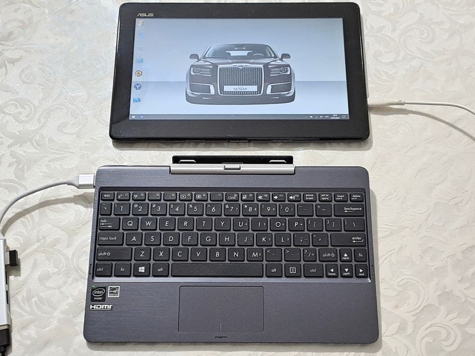 Продается трансформер 2в1 сенсорный нетбук-планшет Asus/ОЗУ2Gb/SSD32Gb