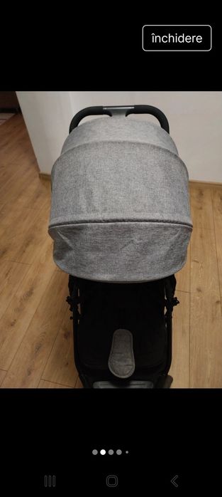 Cărucior gri aproape nou