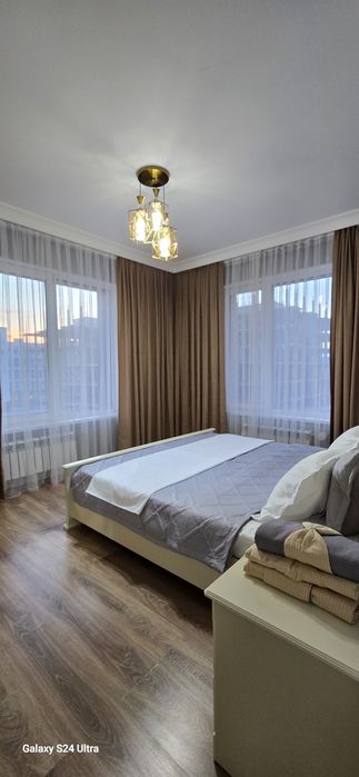 По часам апартаменты в Талане