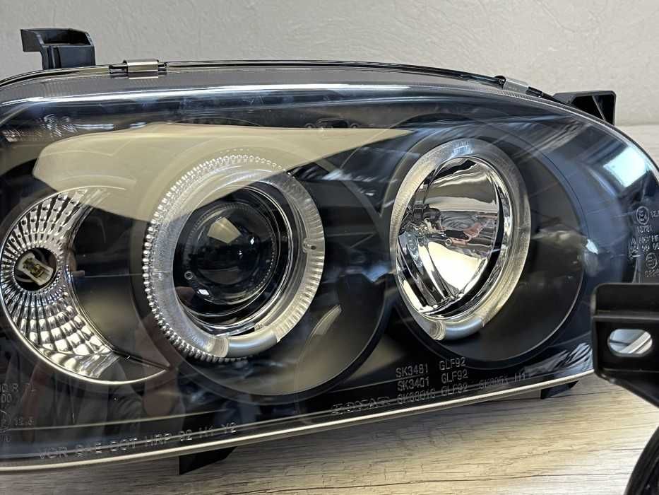 Faruri VW Golf 3 Angel Eyes look negru cu lupa NOU