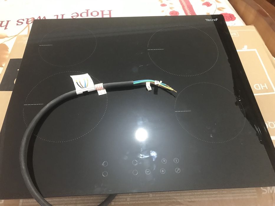 Продам новую индукционную сенсорную кухонную плиту