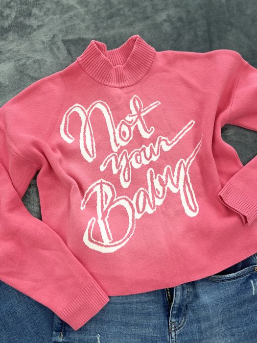 Розово пуловерче