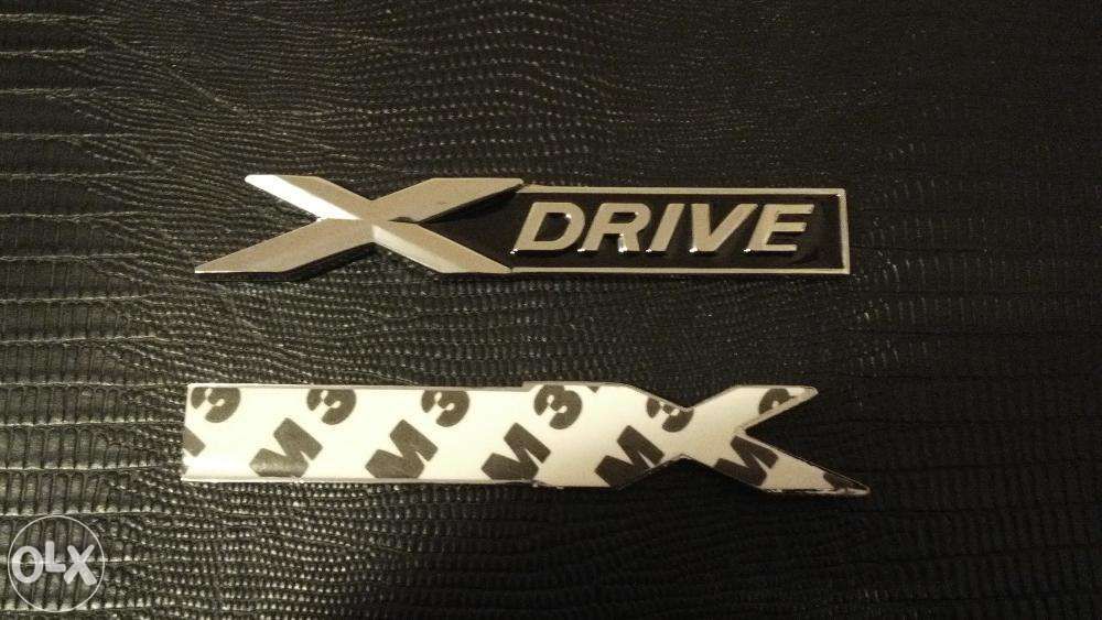 Emblema BMW X-Drive metal negru/crom