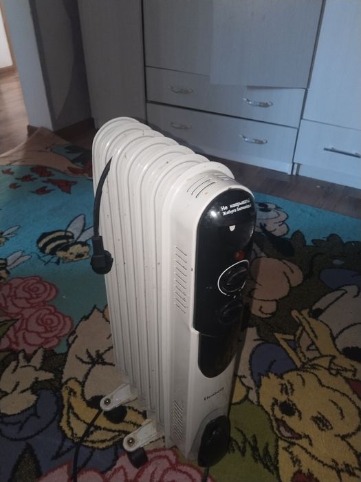 Масляный обогреватель