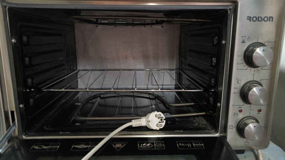 Срочно ! Продам электрический духовой шкаф Roison .