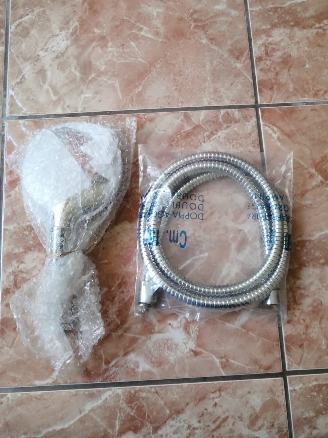 Set dus para + furtun Hansgrohe