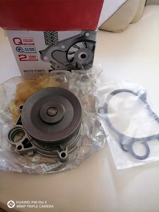 Vand bucse si pompa de apa bmw e46