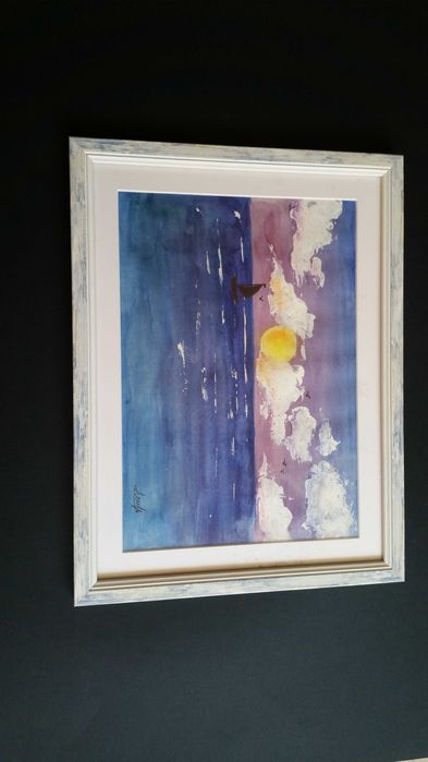 Много красив морски пейзаж. Синьо море, платноходка, облаци,,,слънце.