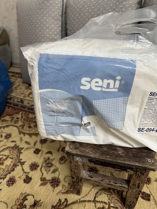 Памперсы seni , расскрытые ,их там 25 штук