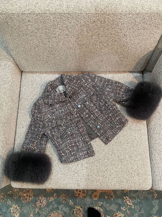 пальто от бренда Молто Калдо.