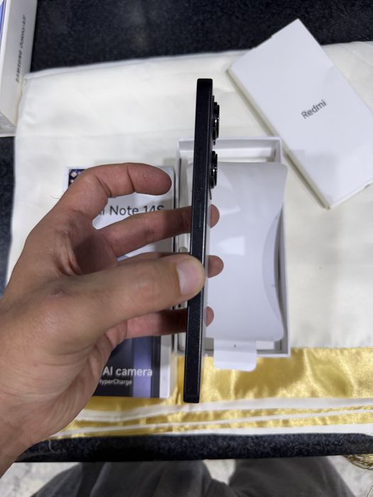 redmi not 14s pamit 8.256g holati ideal karopka dak bor