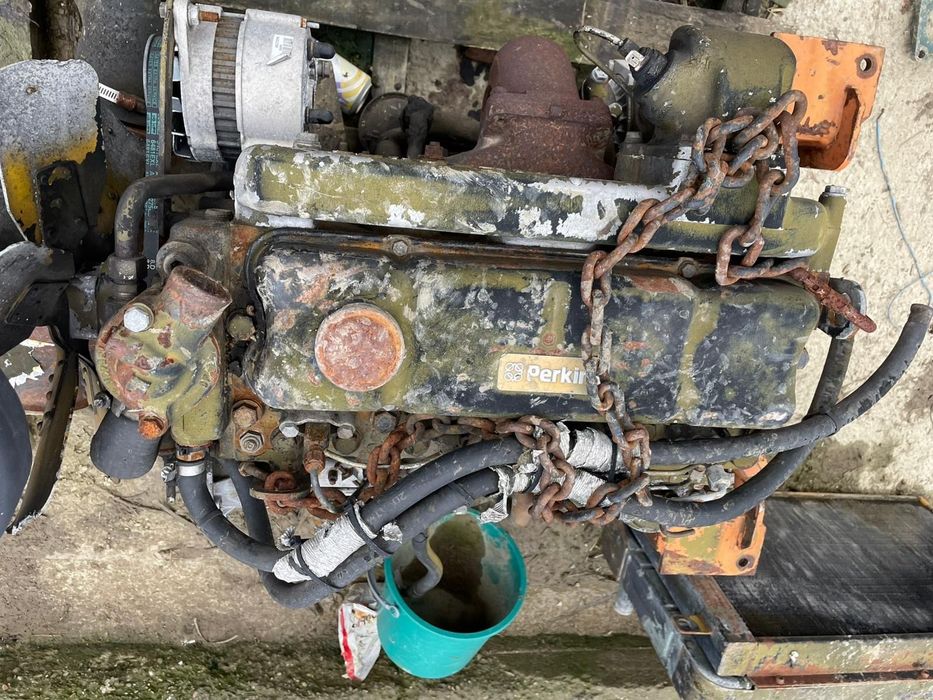 Motor buldoexcavator Caterpillar