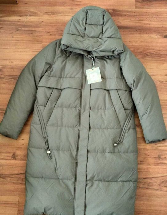 Продам пуховик 48 размера