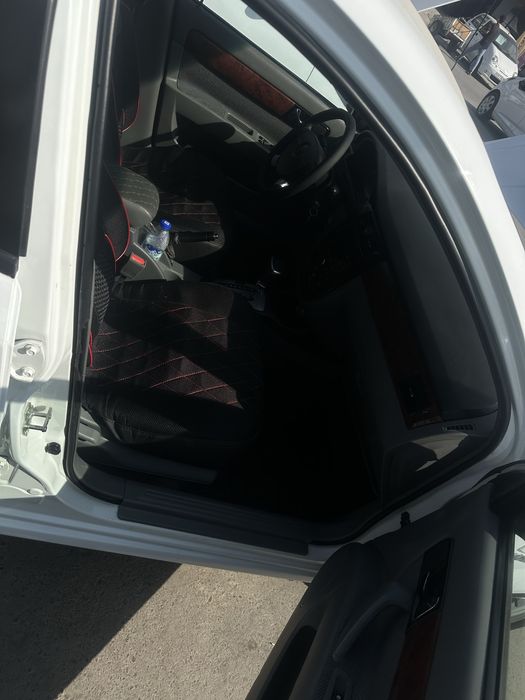 Lasetti 1.6 mator avtomat rangi oq 275.000 yurgan bita pitnosi bor