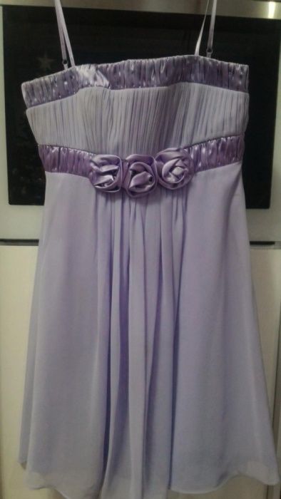 Vând rochie elegantă, culoare mov deschis.