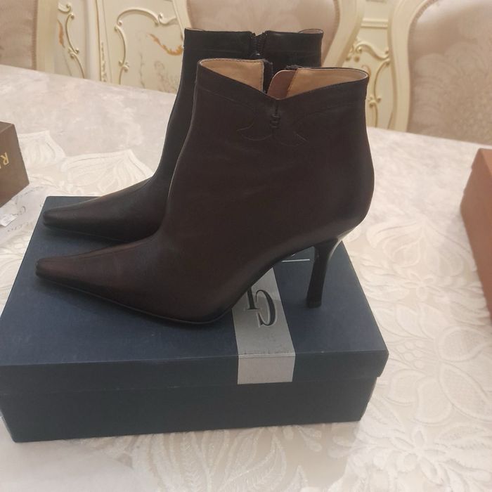 Продам новые сапоги