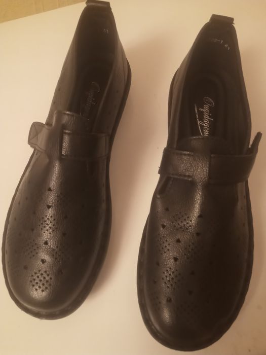Новые кожаные туфли
