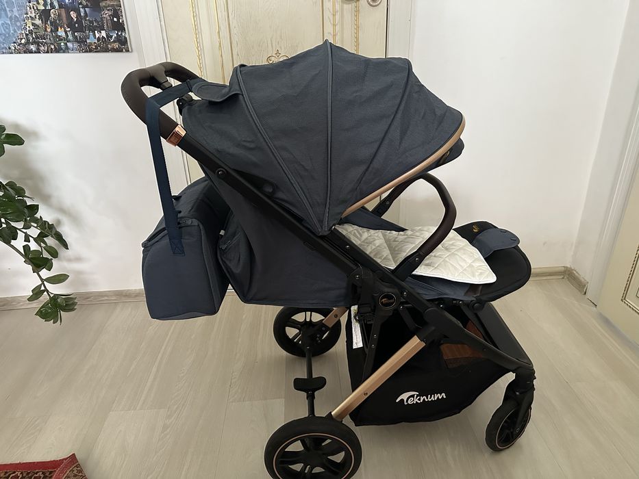 Продам коляску Teknum б/у в отличном состянии толном не пользовались
