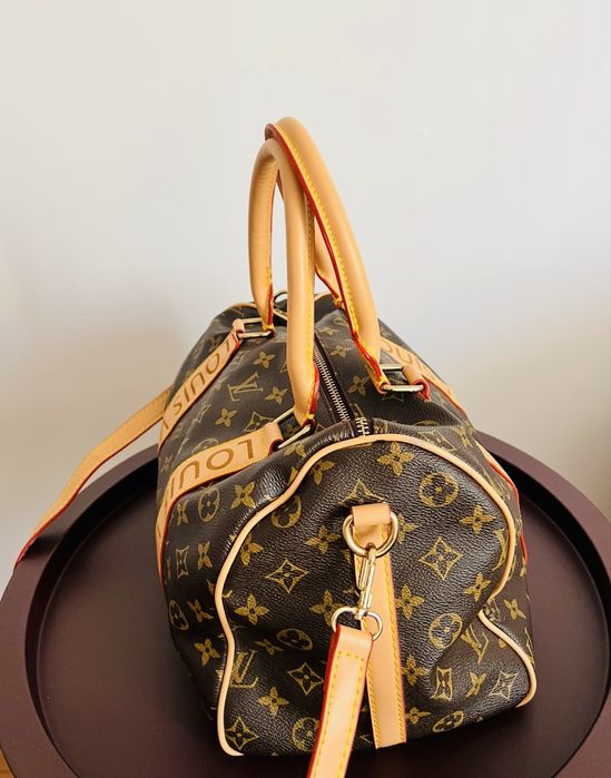 Geanta de umar Louis Vuitton