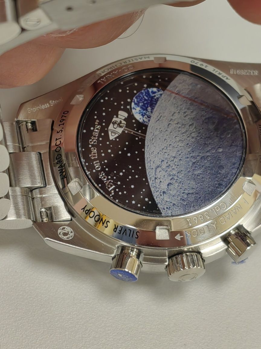 Omega Speedmaster Silver Snoopy 50th anniversary Edition chronograph