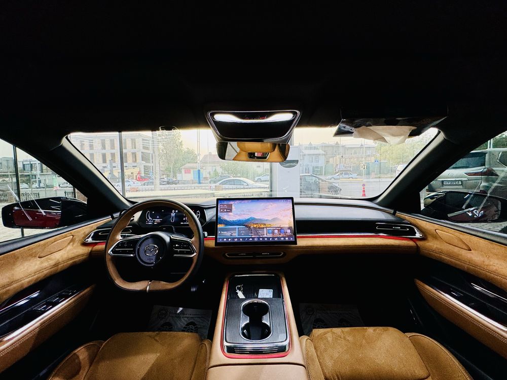 Продается почти новый Mazda EZ6.