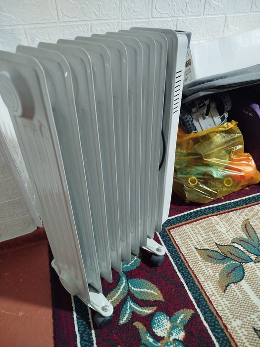 Маслянный обогреватель