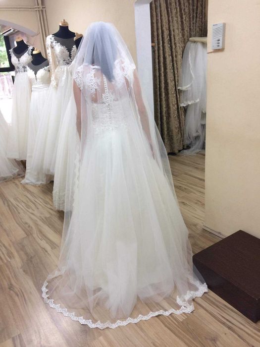 Vand rochie de mireasa Imolacy. Este de culoare ivory, marimea M.