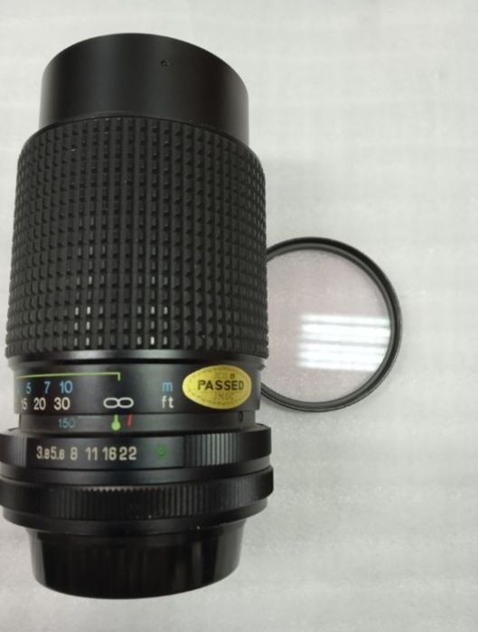 Obiectiv foto.Tokina RMC 75 150mm.       ceas
Tokina rmc 75-150mm. 1:3